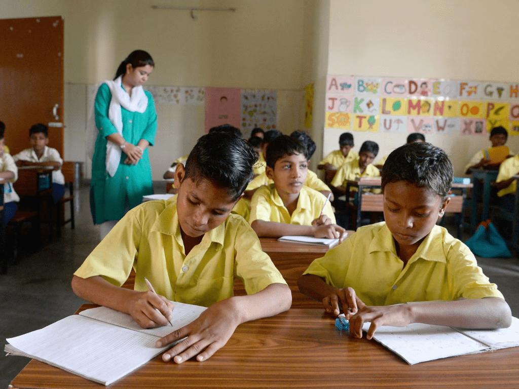Bilingual classroom in Jawahar Navodaya Vidyalaya where students learn in Hindi and English, balancing culture and global communication.