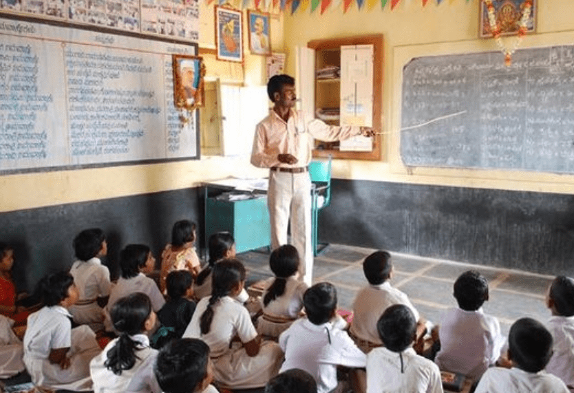 Indian teacher reinforcing learning values during a classroom lesson by connecting it with the morning assembly thought